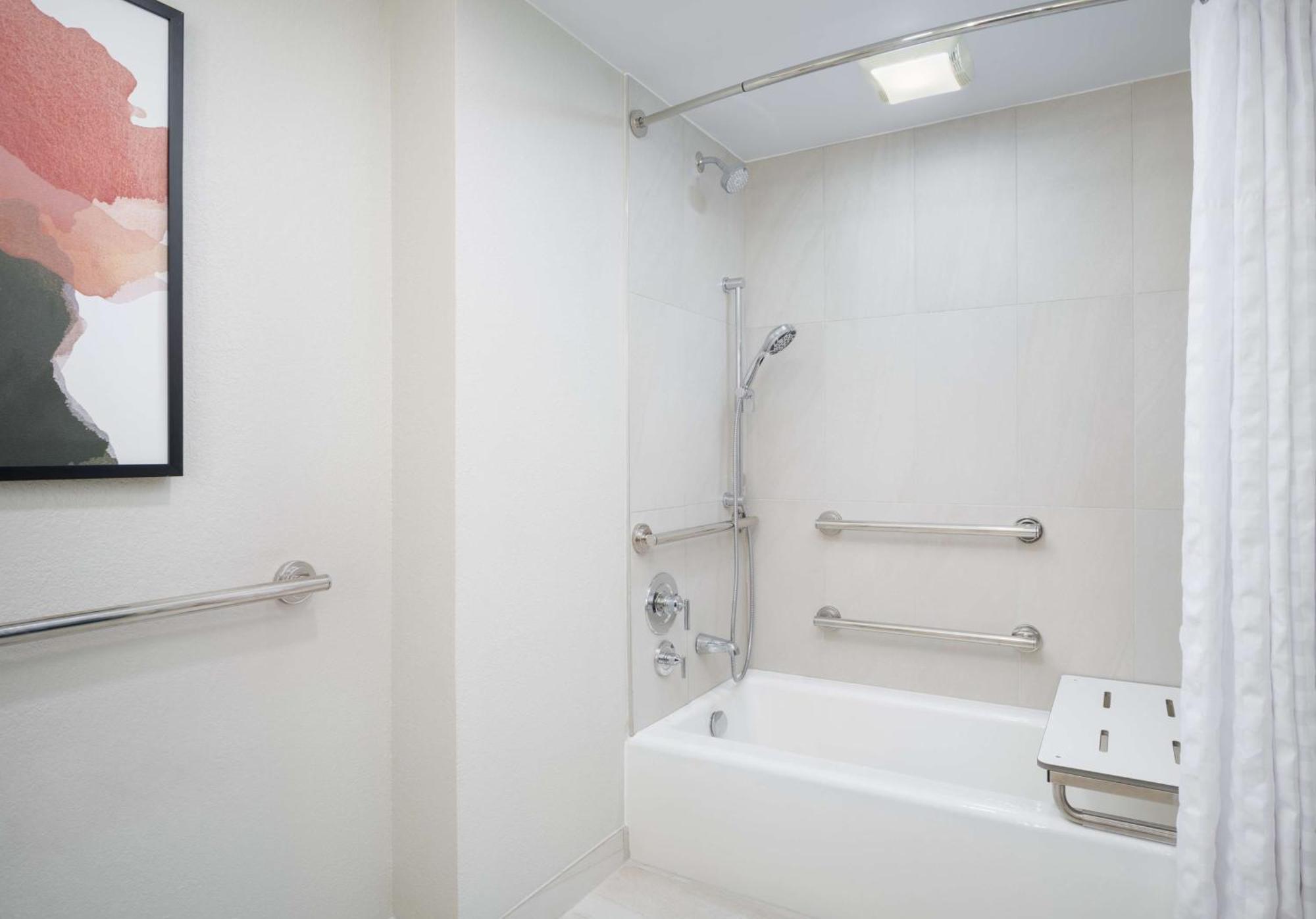 Two-Room King Suite with Bath Tub - Mobility Accessible,1617464857:JPEG